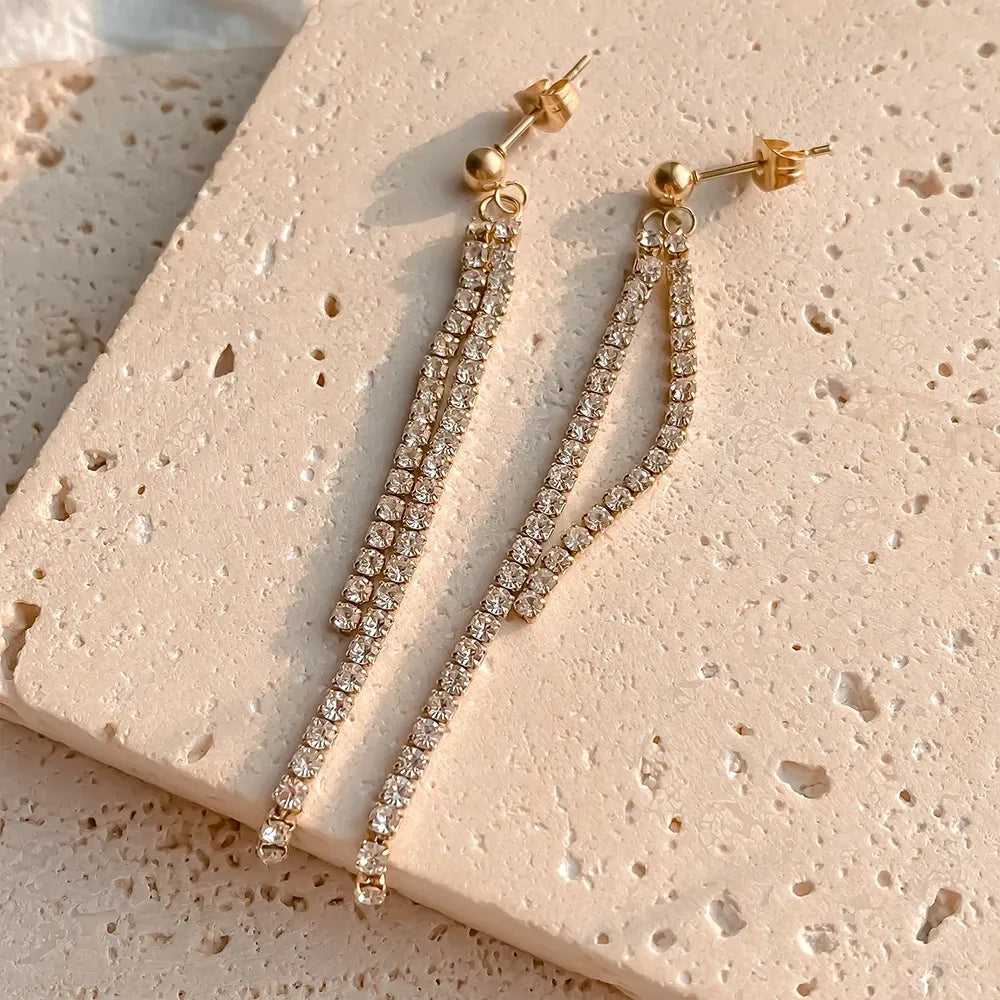 The Celeste Pavé Tassel Earrings
